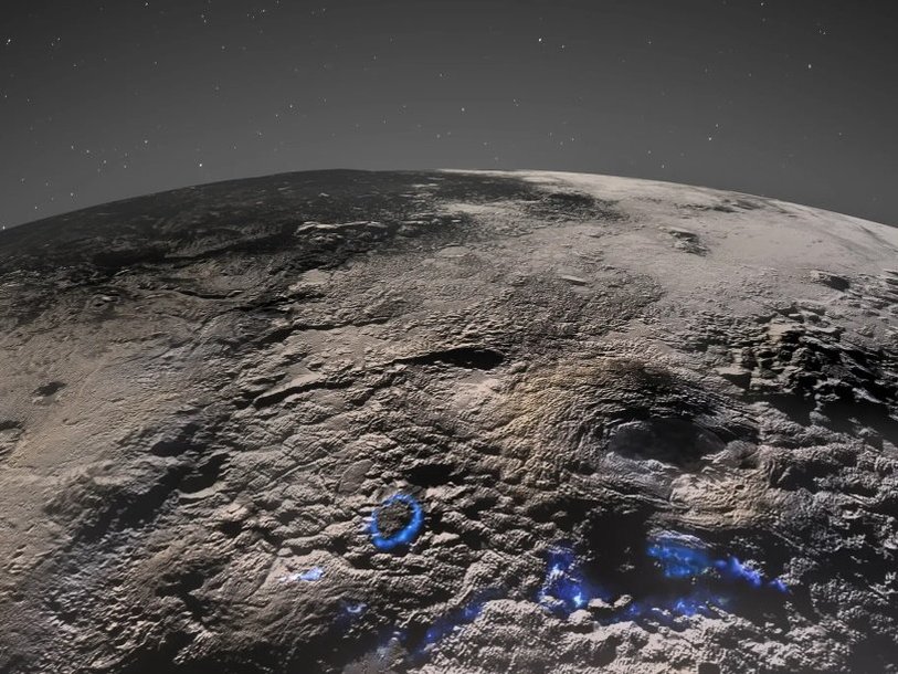 Вулканический регион Плутона. Области вулканической активности отмечены голубым